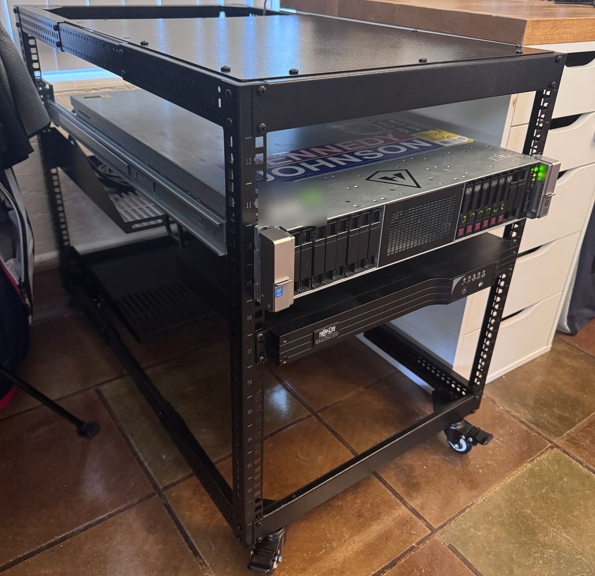 HP ProLiant DL380 Gen9 and Tripp-Lite UPS in the VEVOR 12U open frame rack