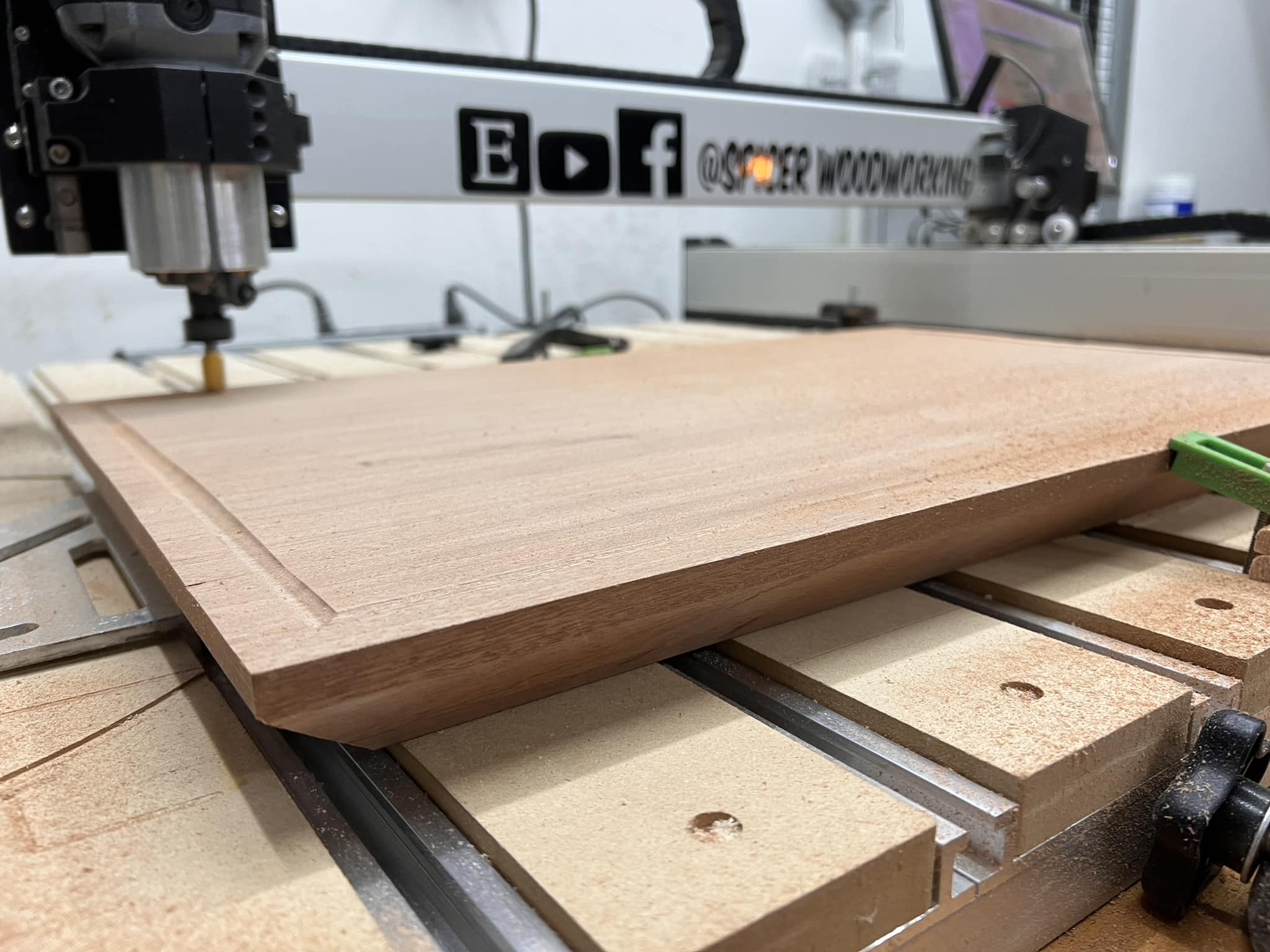 CNC carving close-up on cutting board