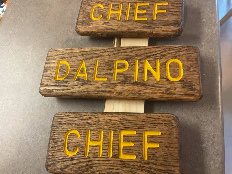 Assorted magnetic wooden name plates
