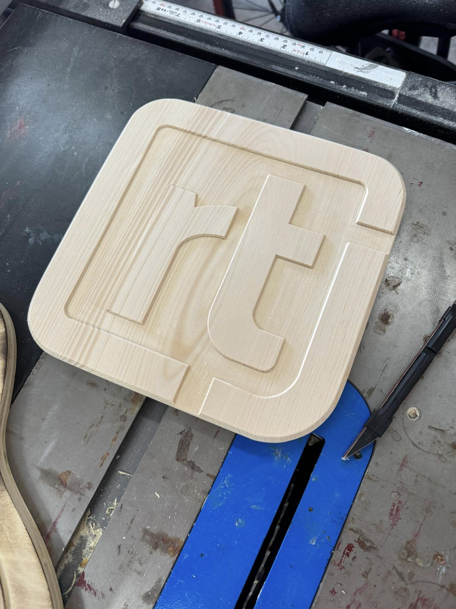 rtj.dev wooden plaque