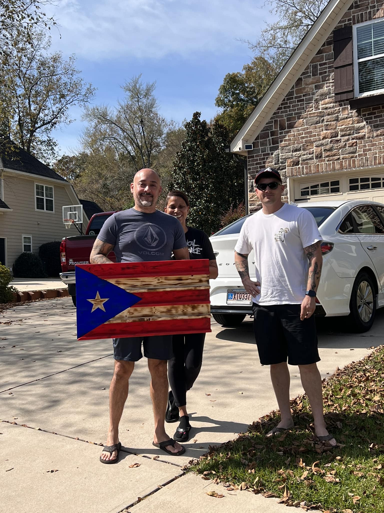 Customer with Puerto Rican wooden flag